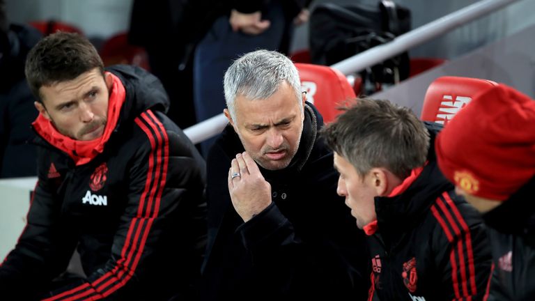 Mourinho in the dugout during his final game as United boss at Anfield