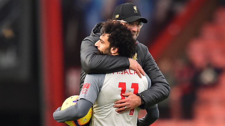 Klopp embraces Mohamed Salah after his hat-trick