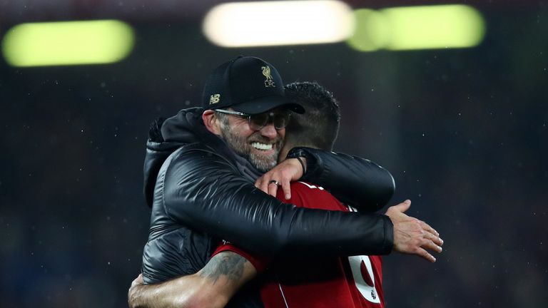 Jurgen Klopp embraces Dejan Lovren after Liverpool's win