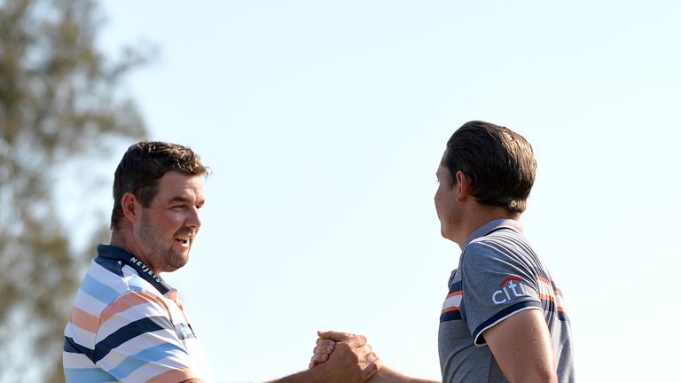 Marc Leishman (L) is Smith's nearest challenger