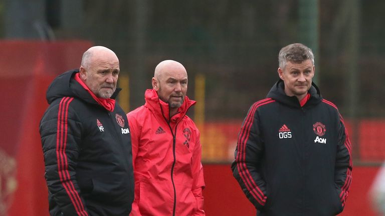 Mark Dempsey observes training alongside Ole Gunnar Solskjaer at United's Aon Training Complex