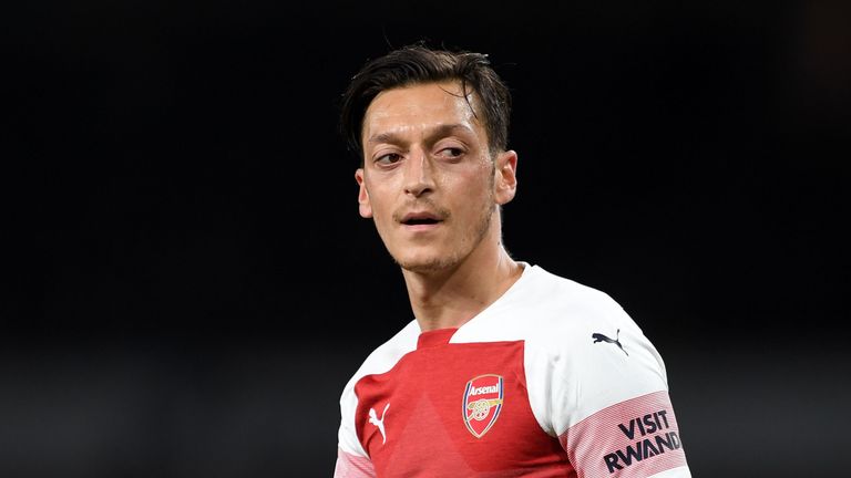 Mesut Ozil has been struggling with a back spasm in recent weeks