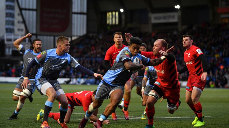 Rey Lee-Lo goes over for Cardiff Blues' first try despite the efforts of Schalk Burger