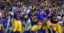Rams run over Cowboys to advance