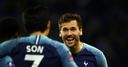 Spurs hit seven to progress