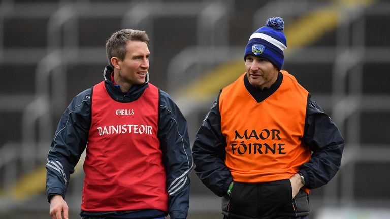 Behind enemy lines: Former Dublin hurler and current Laois strength & conditioning coach Niall Corcoran joined Eddie Brennan on the O'Moore County's sideline against the Dubs