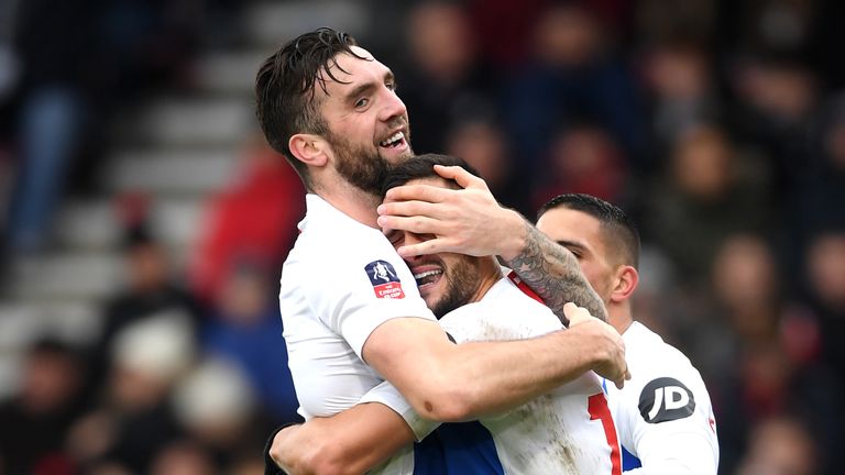 Shane Duffy and Florin Andone celebrate Brighton's third