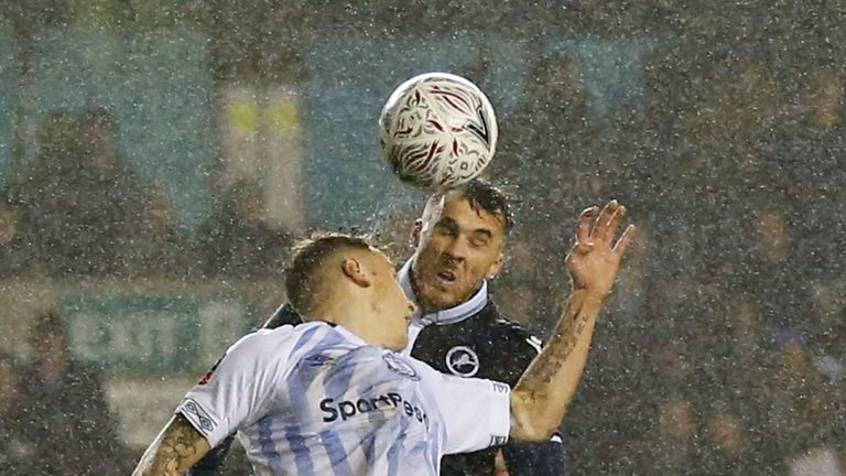 Millwall striker Lee Gregory heads the ball to equalise against Everton on the stroke of half-time