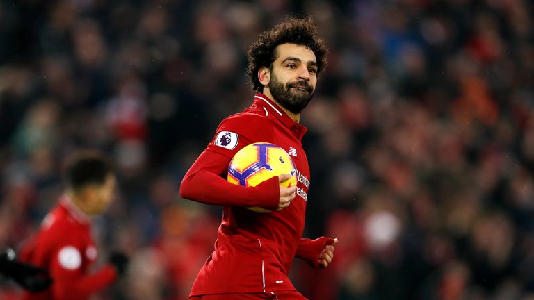 Liverpool's Mohamed Salah celebrates scoring his side's first goal