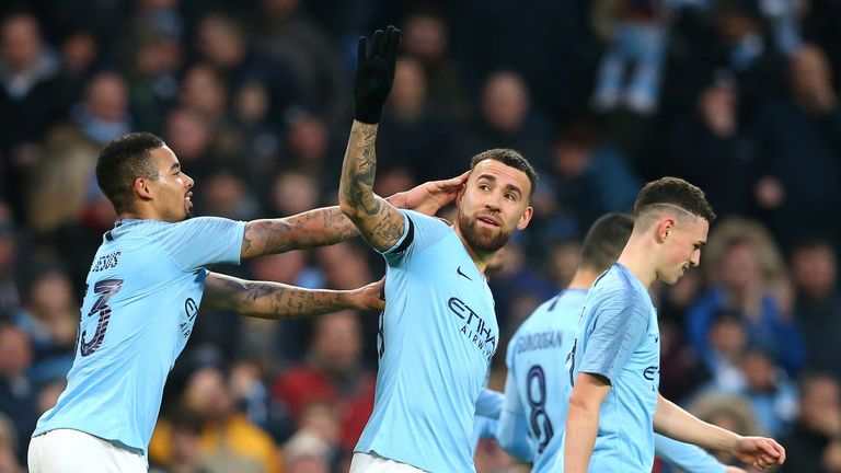 Nicolas Otamendi (C) celebrates scoring against Rotherham