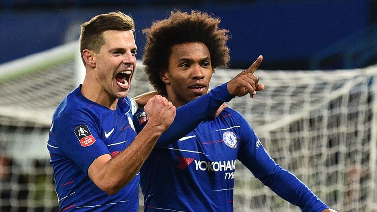Willian celebrates scoring a penalty with Chelsea defender Cesar Azpilicueta