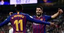 Suarez sinks Real as Barca reach final