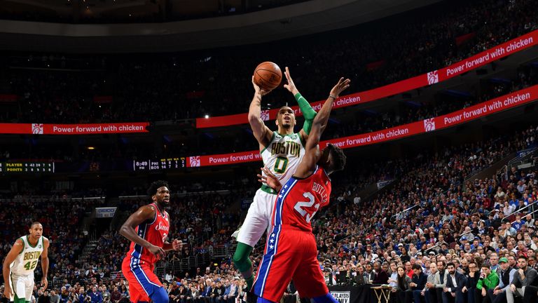 Jayson Tatum elevates over Jimmy Butler