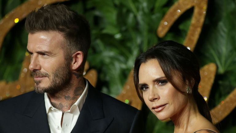 David Beckham with wife Victoria