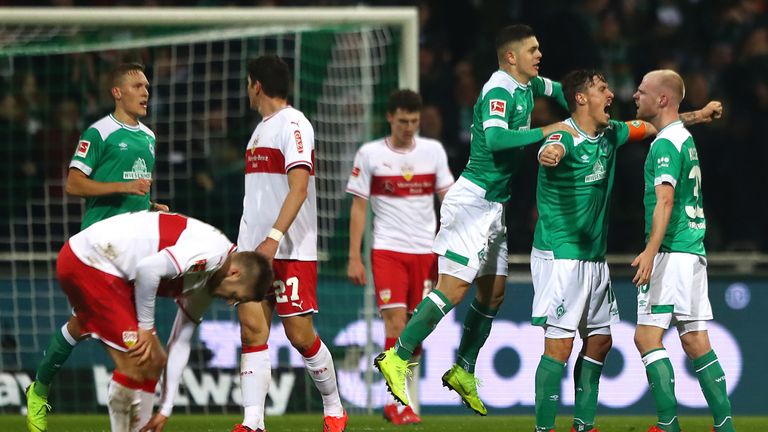Davy Klaassen of Werner Bremen celebrates with team-mate Max Kruse after scoring