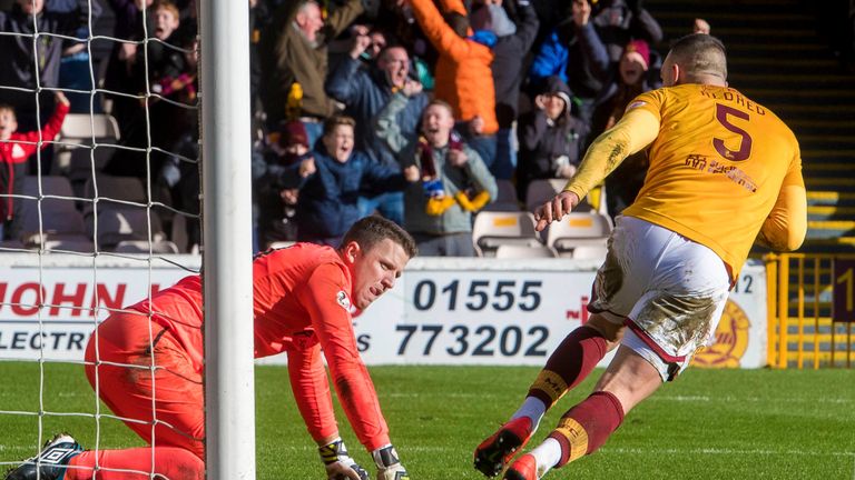 Doyle is downbeat as Tom Aldred wheels away in delight after the late drama