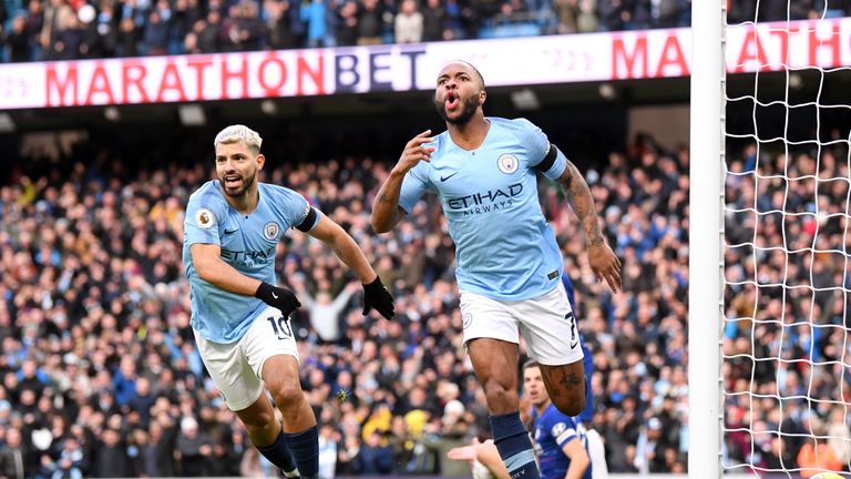 Raheem Sterling celebrates scoring City's first