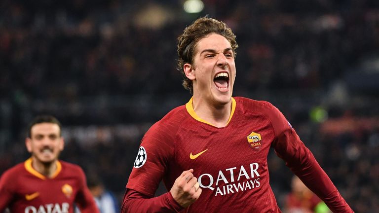 Nicolo Zaniolo celebrates after opening the scoring for Roma against Porto