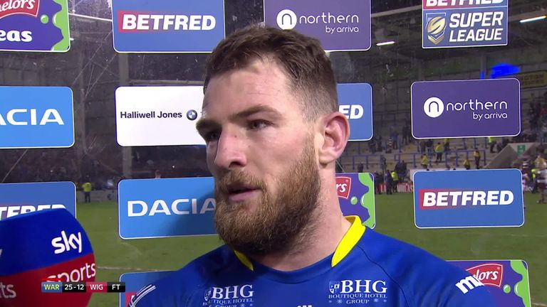 Daryl Clark reacts to Warrington's win over the champions