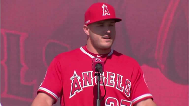 A clearly emotional Mike Trout has targeted championship success for LA Angels after he signed a record-breaking $426.5m (£323m) 12-year deal