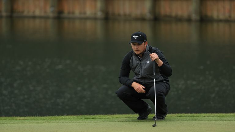 Pepperell lines up a putt at the 18th during the final round of The Players Championship