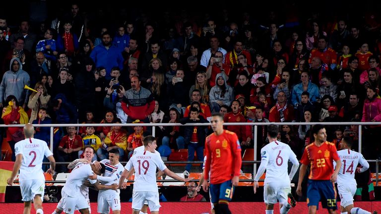 Josh King celebrates his well-struck penalty to haul Norway level