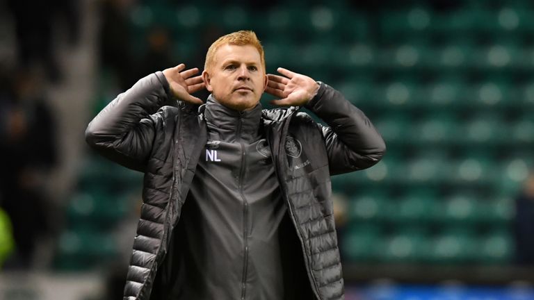 Neil Lennon celebrates in front of the fans at full time