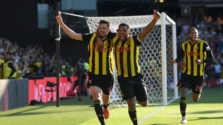 Troy Deeney and Craig Cathcart celebrate during Watford's win over Spurs