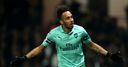 Arsenal edge 10-man Watford to go fourth