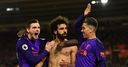 Salah sends Liverpool top in late show