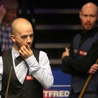 Gary Wilson (right) won a 79-minute long final frame against Luca Brecel on Sunday