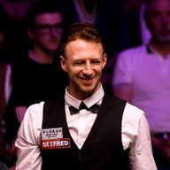 Judd Trump set up a quarter-final against Scotland's Stephen Maguire