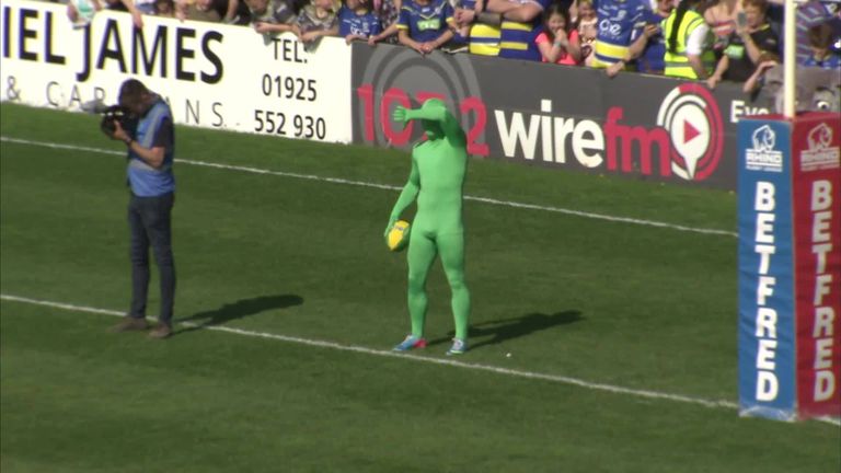 Marwan Koukash challenged Warrington's Wire Flyer to a race during half-time of their Super League clash with Salford