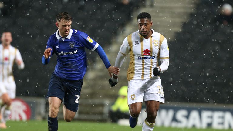 MK Dons midfielder Chuks Aneke was allegedly subjected to racist abuse on social media