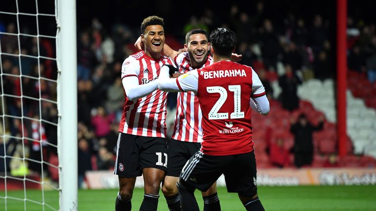 Oliver Watkins celebrates scoring for Brentford against Ipswich