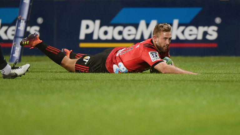 Braydon Ennor scoring one of the Cruasders' tries against the Highlanders