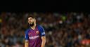 Suarez defends cup final absence