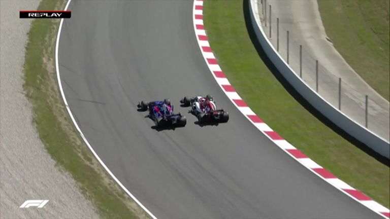 Wow, watch this! Daniil Kvyat brilliantly overtakes Kimi Raikkonen around the outside of Turn Four at Barcelona