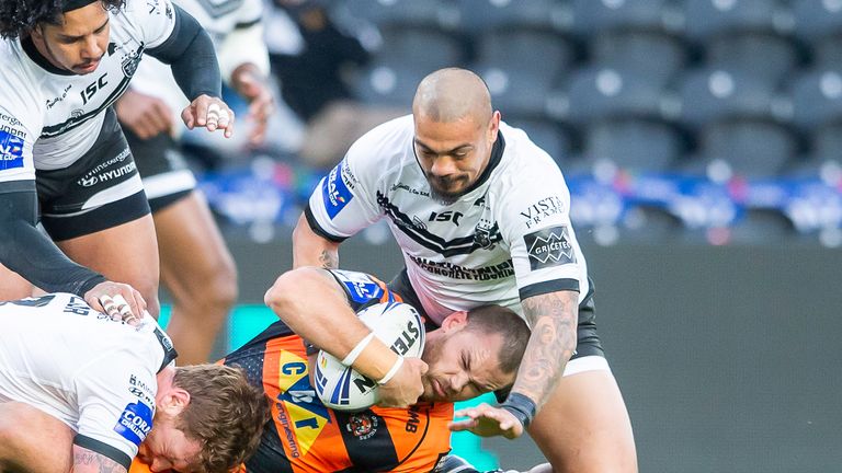 Castleford's Cheyse Blair is tackled by Scott Taylor and Sika Manu