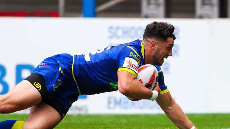 Declan Patton scores for Warrington against Wigan in the Challenge Cup last year