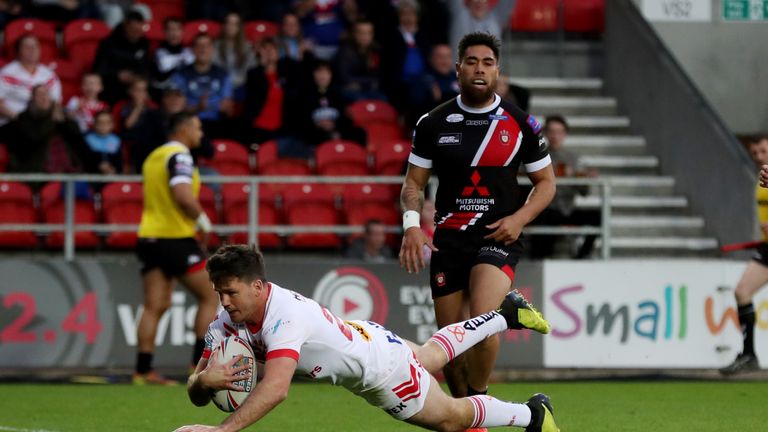 Lachlan Coote goes over for St Helens' second try