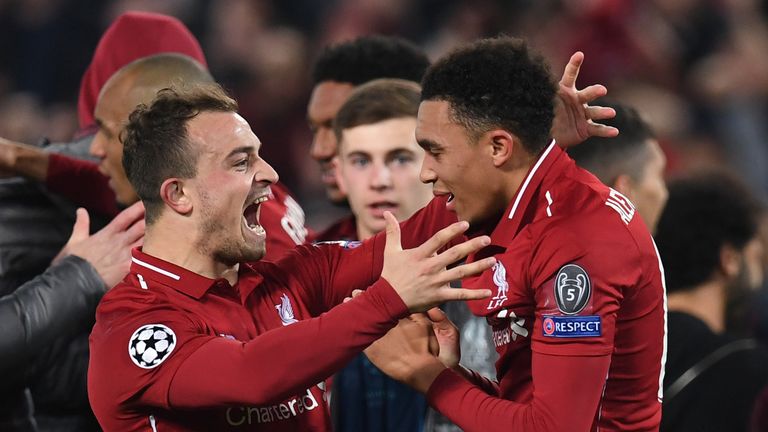 Trent Alexander-Arnold and Xherdan Shaqiri celebrate after Liverpool beat Barcelona 4-0 in the Champions League