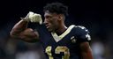 Saints WR Thomas a no-show at camp