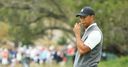 Tiger 'hangs in there' to fire 70