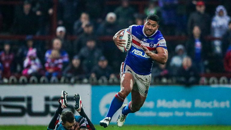 Wakefield's Kelepi Tanginoa makes a break from Leeds' Richie Myler.