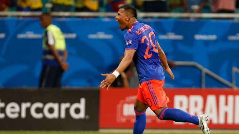 Roger Martinez wheels away after firing Colombia into the lead