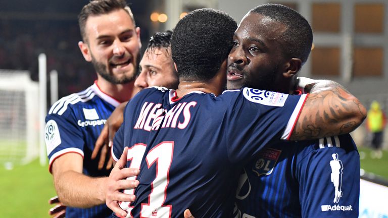 Ndombele celebrates a goal for Lyon