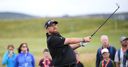 Lowry plays down home hopes