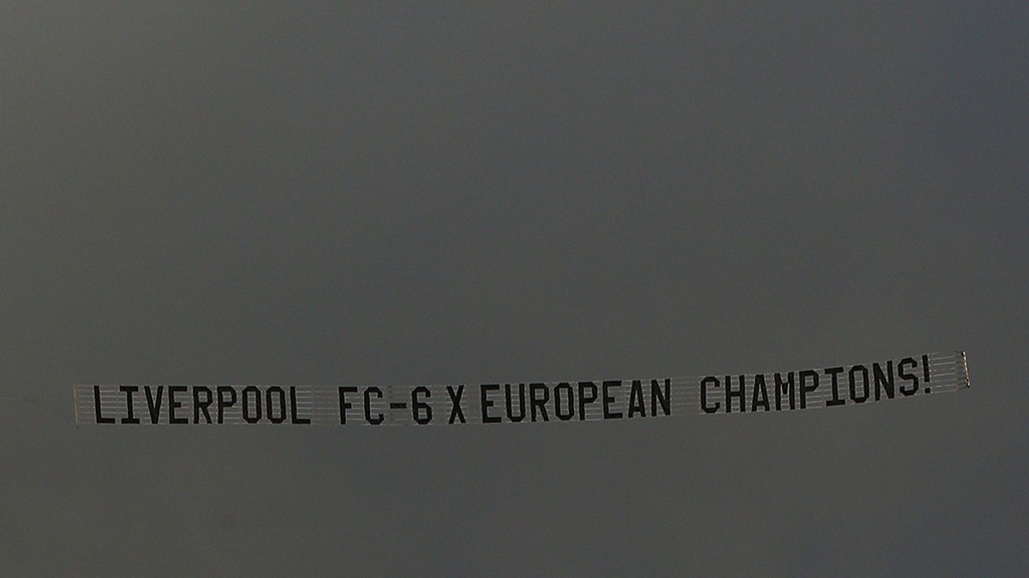 Liverpool Unveil Champions League Banner At Manchester United
