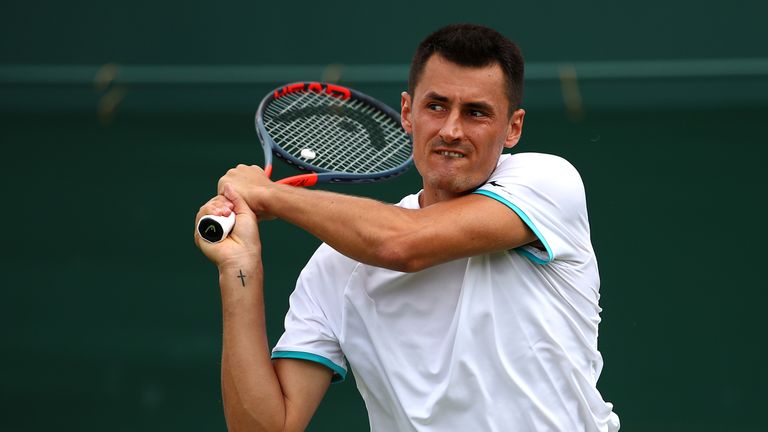 Bernard Tomic has been fined for a lack of effort in his first-round match at Wimbledon